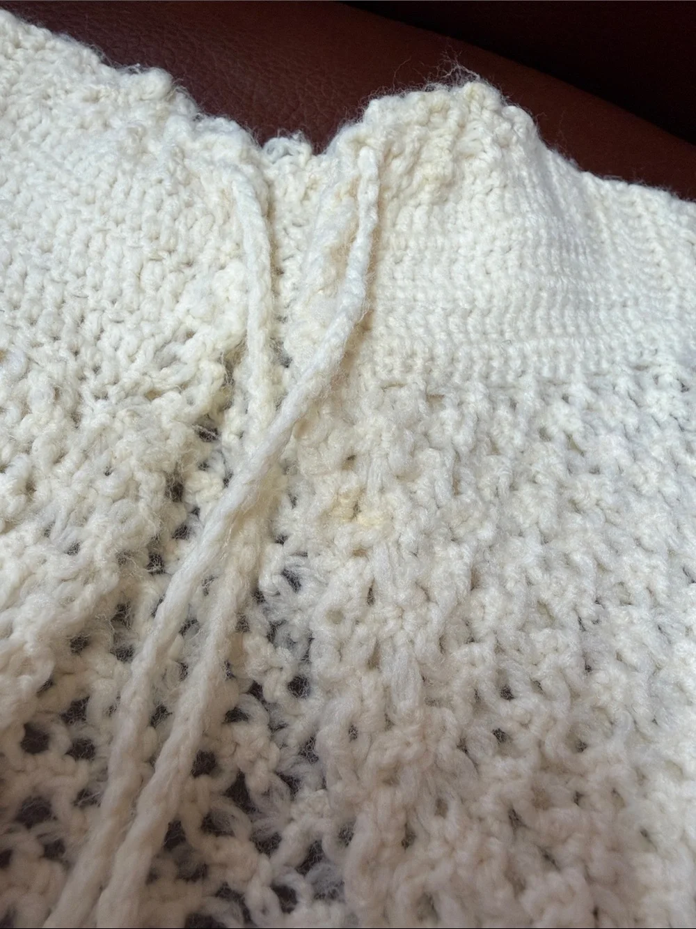 1950’s Cream Knit Open-Front Baby Sweater with Pom Tie
